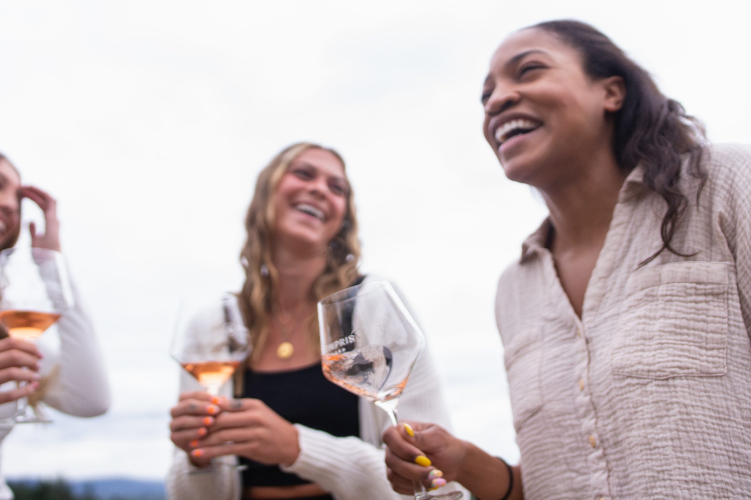 A group of friends enjoying at tasting at Compris Vineyards in Chehalem Mountains